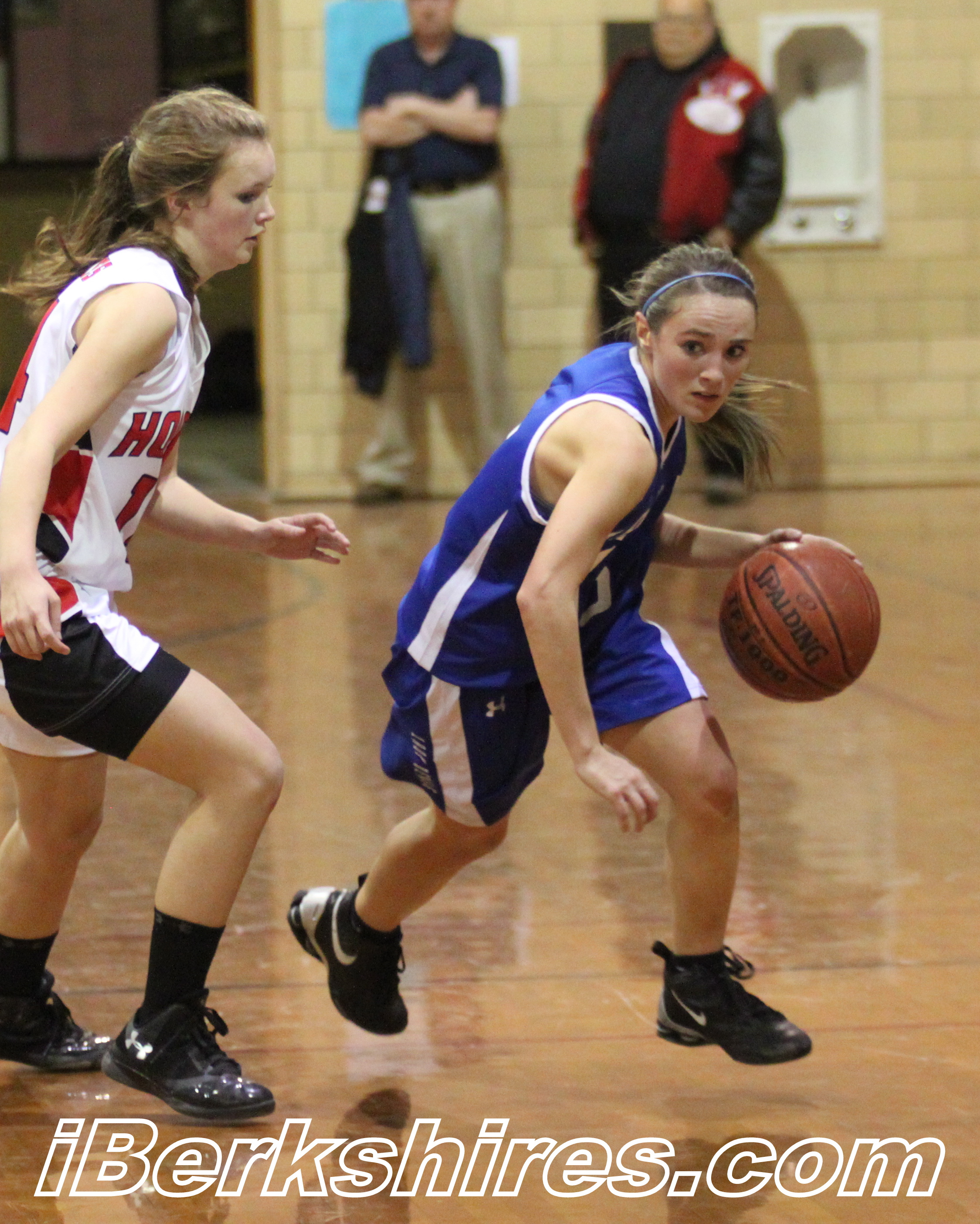 Mariah Ferrara drives past Hoosac's Jenn Gale.
